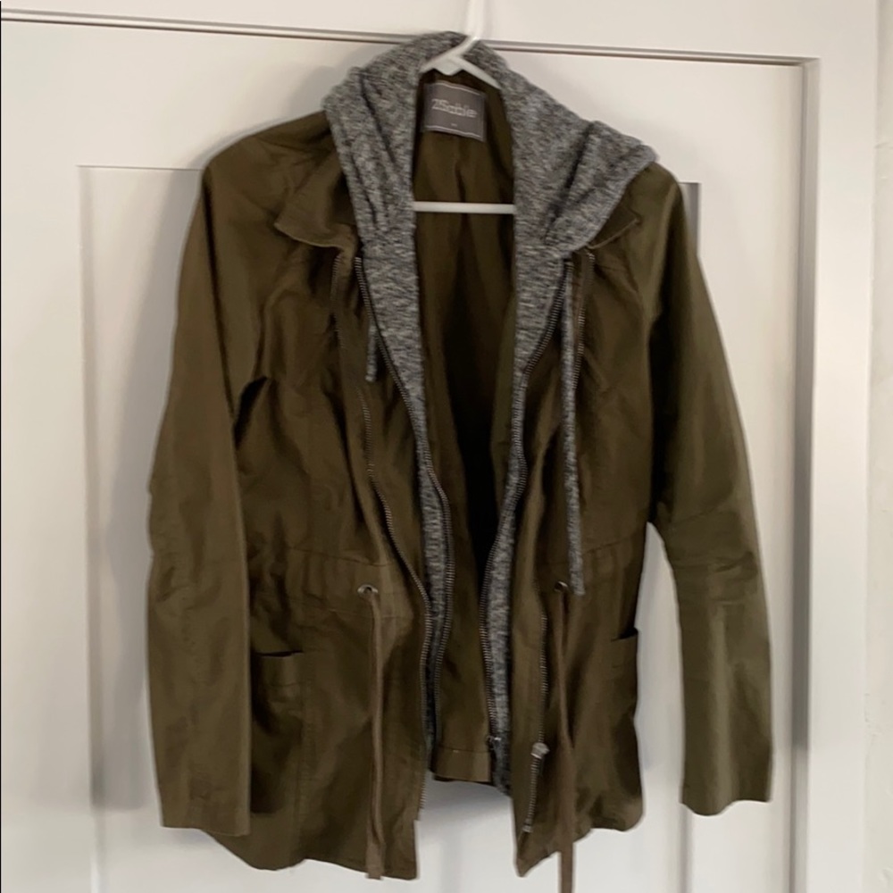 Army green cargo jacket with Grey sweatshirt peek
